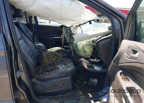 2016 Ford Escape Titanium z USA, uszkodzony, nr VIN 1FMCU9J95GUB57721